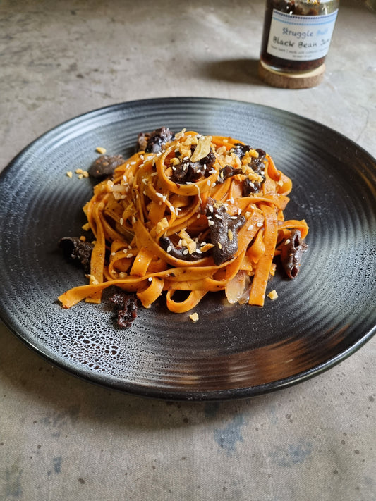 Black bean pasta with black mushrooms